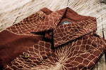 Upena aloha shirt folded close-up product shot